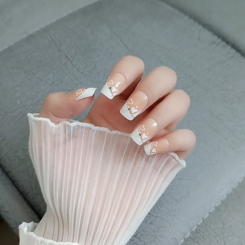 Ventas nacionales de goma de respaldo desmontable de uñas 24 piezas de parche de uñas falsas de alta sensación de uñas al por mayor productos terminados