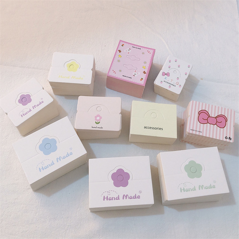 Dongdaemun de Corea del Sur, el mismo tipo de tarjeta de cabello, embalaje de cabello coreano, anillo de cabello, cuerda de cabeza, papel de doble propósito