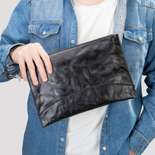 真牛皮广州真皮大牌手拿包手抓纹头层牛皮轻奢男士手机收纳挽包