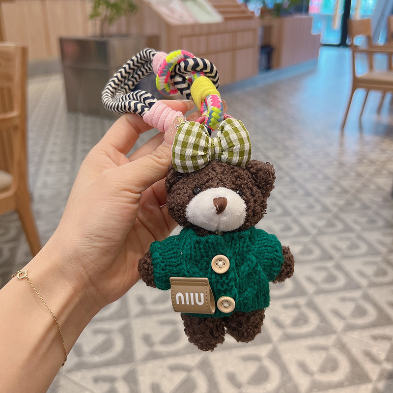 新商品のアニメの蝶結びのセーターの熊の車のキーホルダーのアイデアのぬいぐるみのカバンの装飾の女性