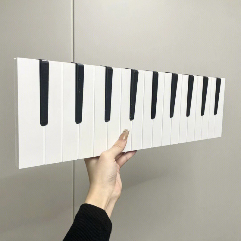 Creativo piano llave puerta colgar gancho de ropa en la casa colgar percha de ropa estante de pared ropa bolsa gancho porche