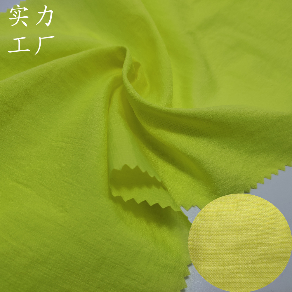 0.1迷你格子低弹尼丝纺布料防绒薄款保暖蓬松儿童休闲防晒服面料