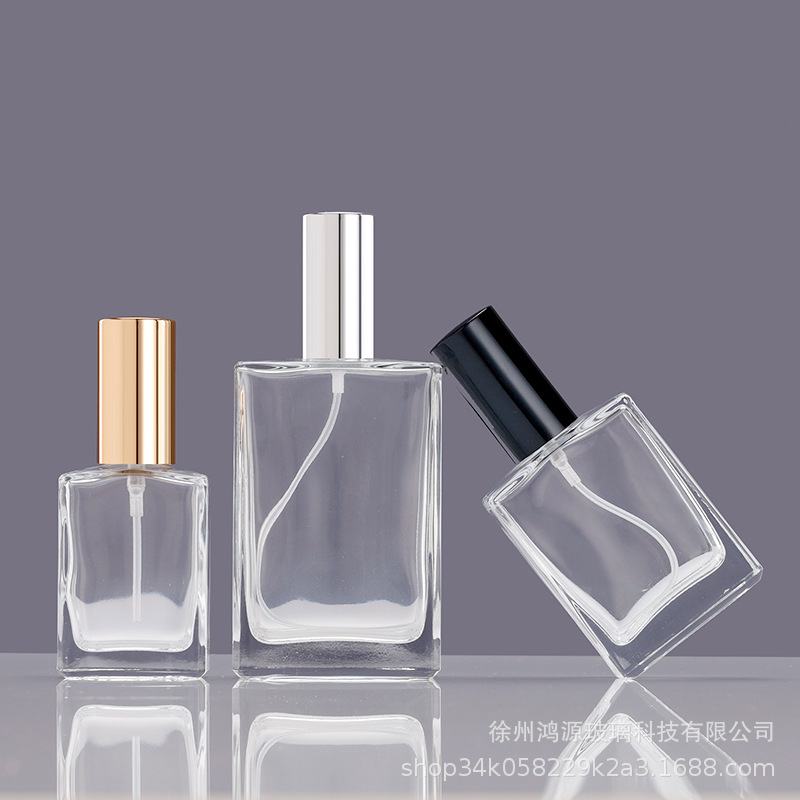 En stock botella de perfume al por mayor de vidrio 30ml 50ml transparente hidratante botella de aerosol fino tornillo boca portátil sub-botella 100