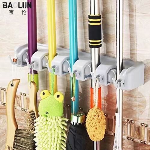 Fabricante de suministro directo multifuncional mágico de plástico trapeador marco de sujeción gancho trapeador escoba percha de almacenamiento de drenaje de agua