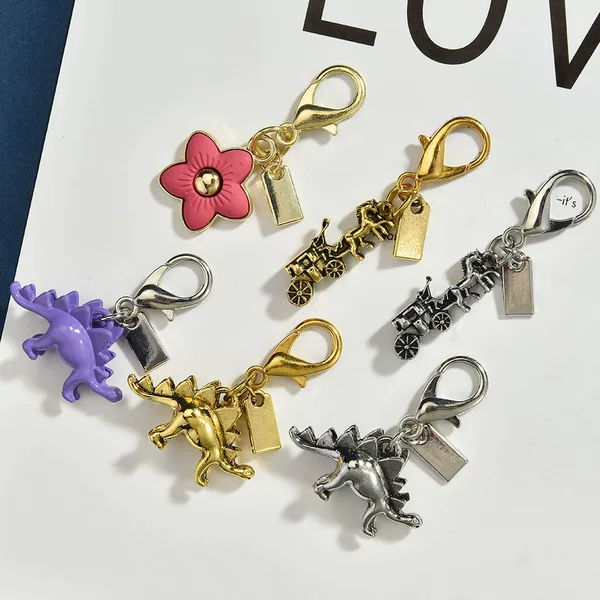 Cross-Border Hot-Selling Saber-Toothed Dragon Bag Pendant, Fashionable and Unique Keychain Pendant, Wholesale Support for Song Brocade Pony Pendant