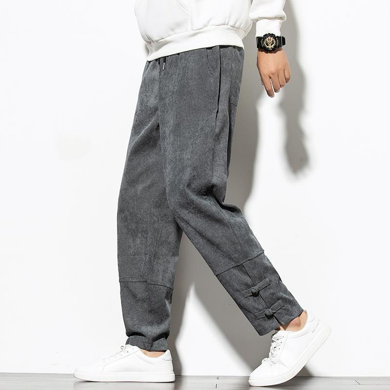 Pantalones de pana Pantalones casuales de primavera y otoño de moda para hombres Pantalones harem con hebilla de disco de estilo chino Tang Pantalones sueltos de gran tamaño