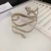 Серебряный, змеевидный