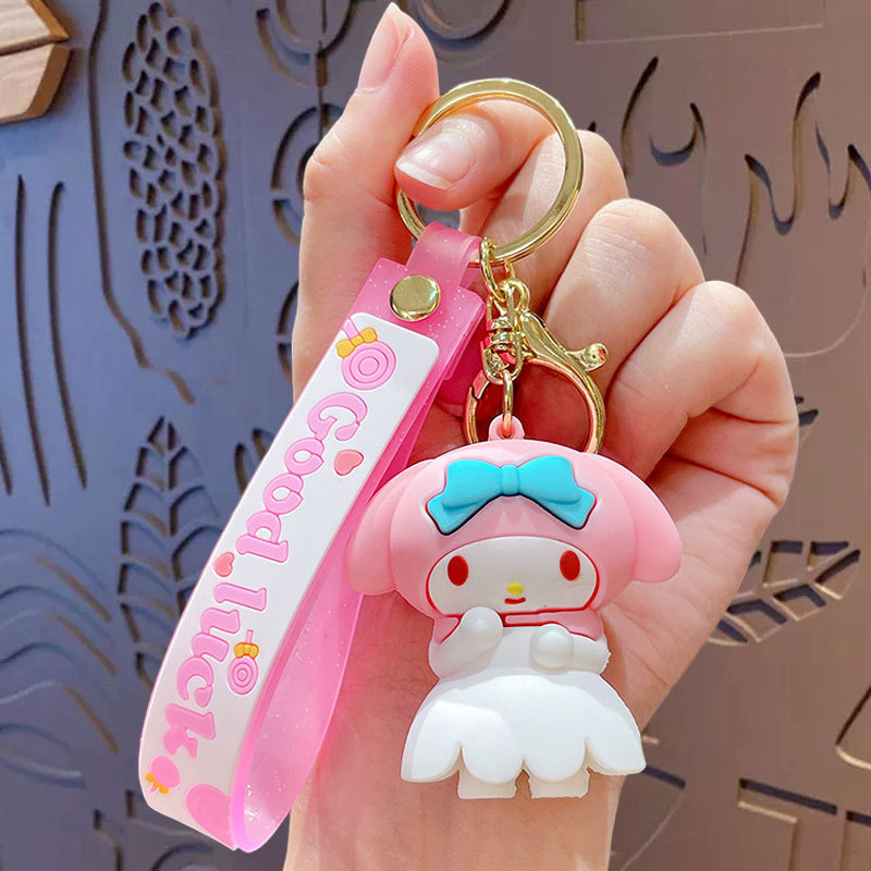Cartoon Sanrio llavero Kulomi Yugui perro de goma suave muñeca niña corazón colgante colgante pequeño regalo al por mayor