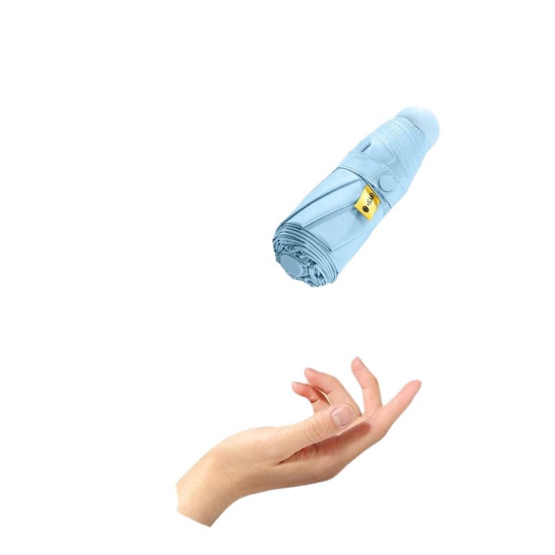 Mini bolsillo cápsula paraguas pequeño negro fresco protector solar paraguas soleado y lluvioso protección UV paraguas de cinco pliegues
