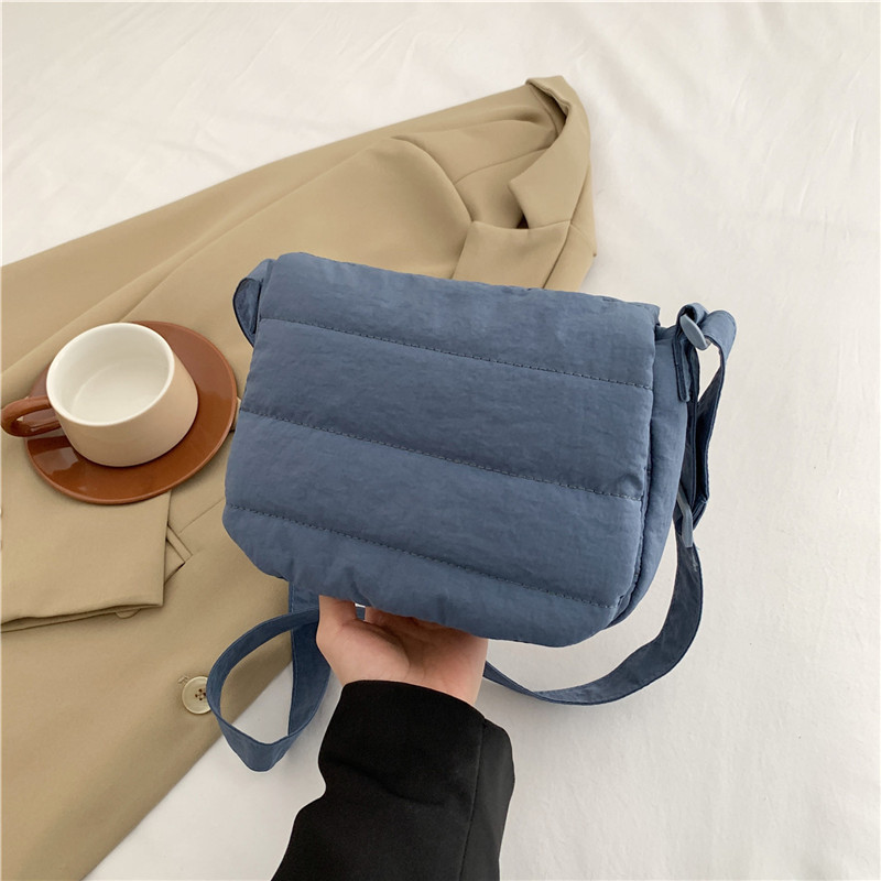 Daily casual simple small square bag Korean spring lightweight personality design popular shoulder crossbody horizontal small square bag_voghion.com