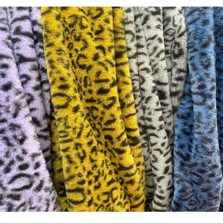 Pequeña piel de conejo impreso anillo de leopardo Imitación Piel de conejo franela ropa abrigo bolsa tela felpa alfombra de juguete tela en stock