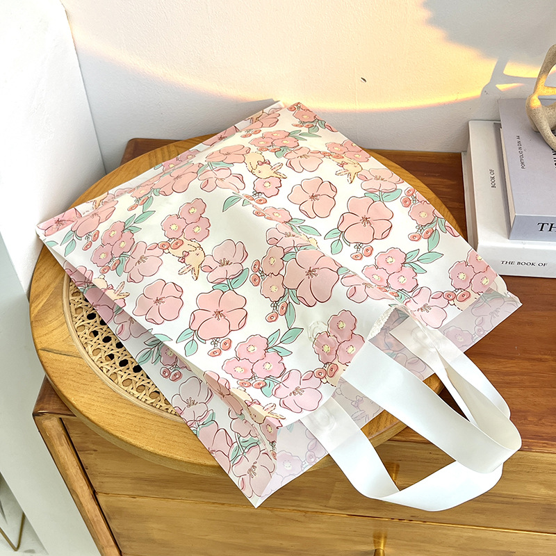 Nueva Rosa flor de cerezo tienda de ropa bolsa de compras bolsa de regalo fresco Lindo bolso de plástico grueso cosméticos
