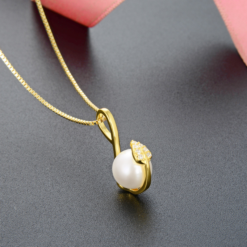 Corea del Sur Dongdaemun Luz de lujo clavícula cadena collar S925 plata diamante-incrustado oro amarillo grano hoja colgante hembra al por mayor