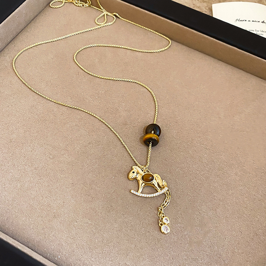 Oro verdadero eléctrico galvanis colgante de piedra pony pendientes collar ligero lujo nicho universal conjunto temperamento alta sensación de joyería mujer