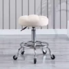 Creamy white round stool (iron wheel)