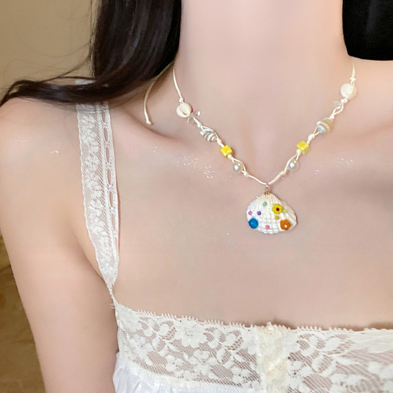 Cuerda de cera, estrella de mar, concha, colgante de perlas, collar, verano, vacaciones, cadena de clavícula, temperamento fresco y dulce