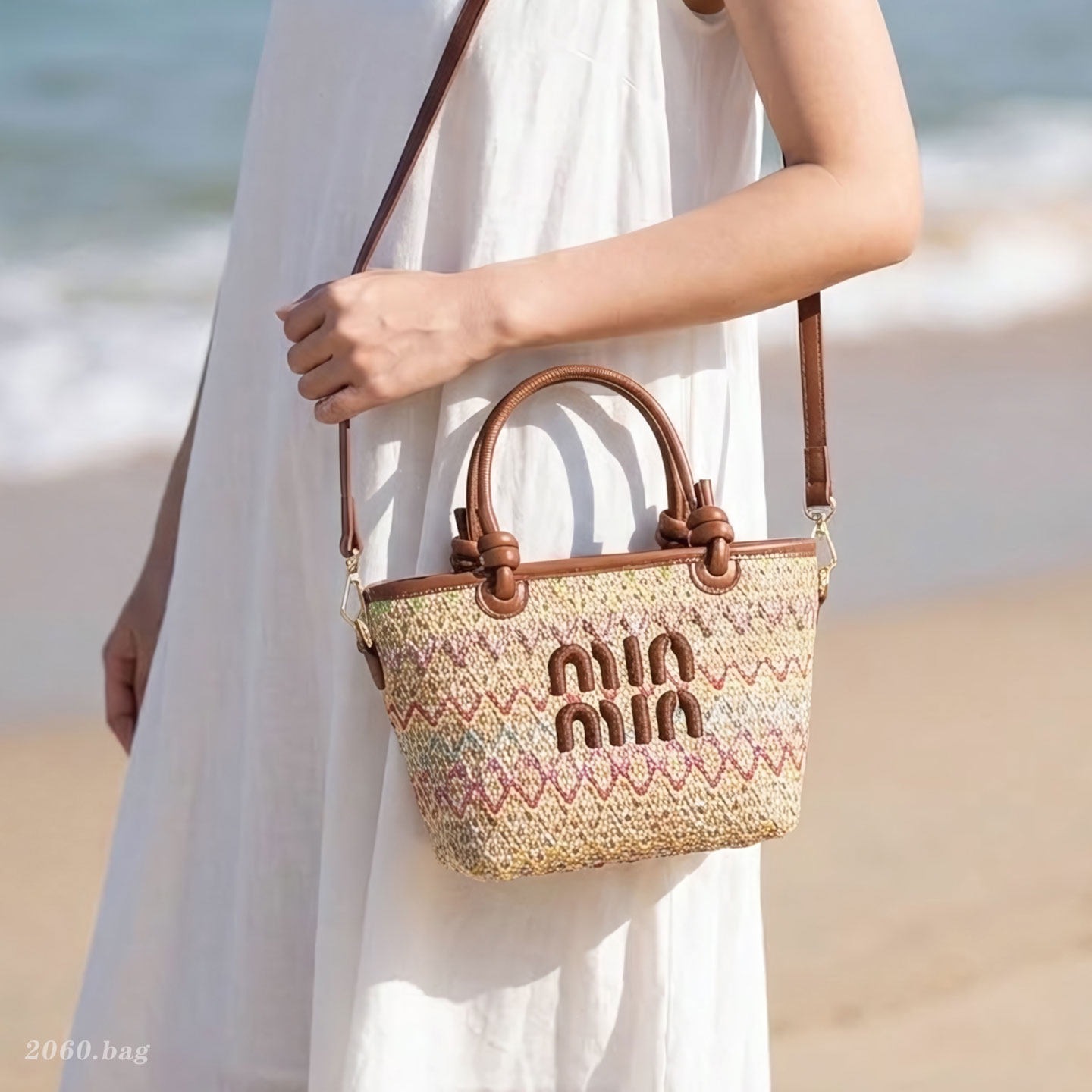Bolsa de moda de verano de nuevo tejido portátil para mujeres 2026 balde de vacaciones bolsa de viaje bolsa de tela de paja casual mochila