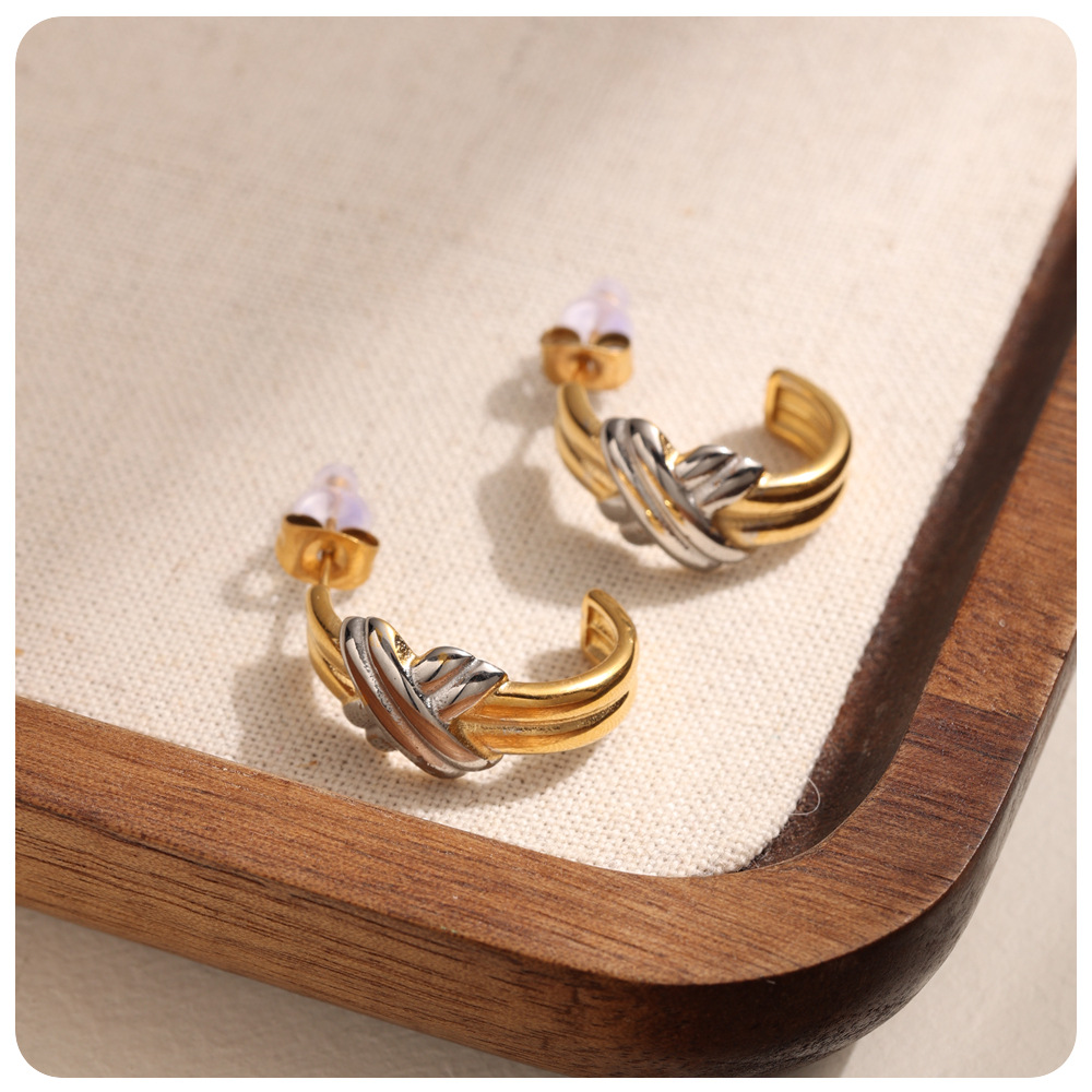 Taina creativo oro y plata de acero inoxidable de alto nivel nicho de acero de titanio pernos de orejas de moda de mujer personalidad orejas