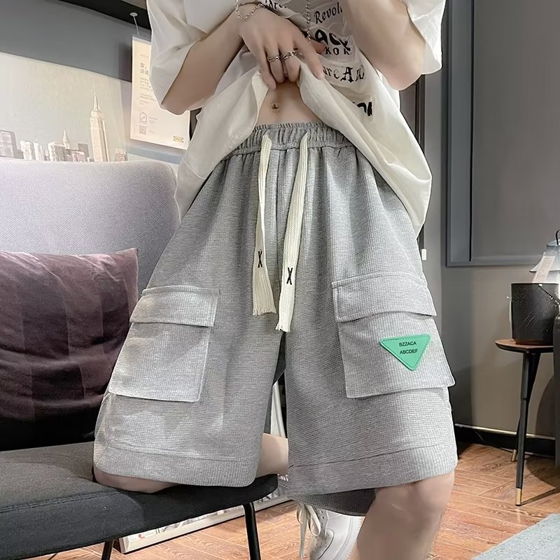 Pantalones cortos casuales de verano de moda para hombres, marca ins de moda, color sólido, contraste simple, tubo recto suelto, pantalones deportivos de cinco puntos