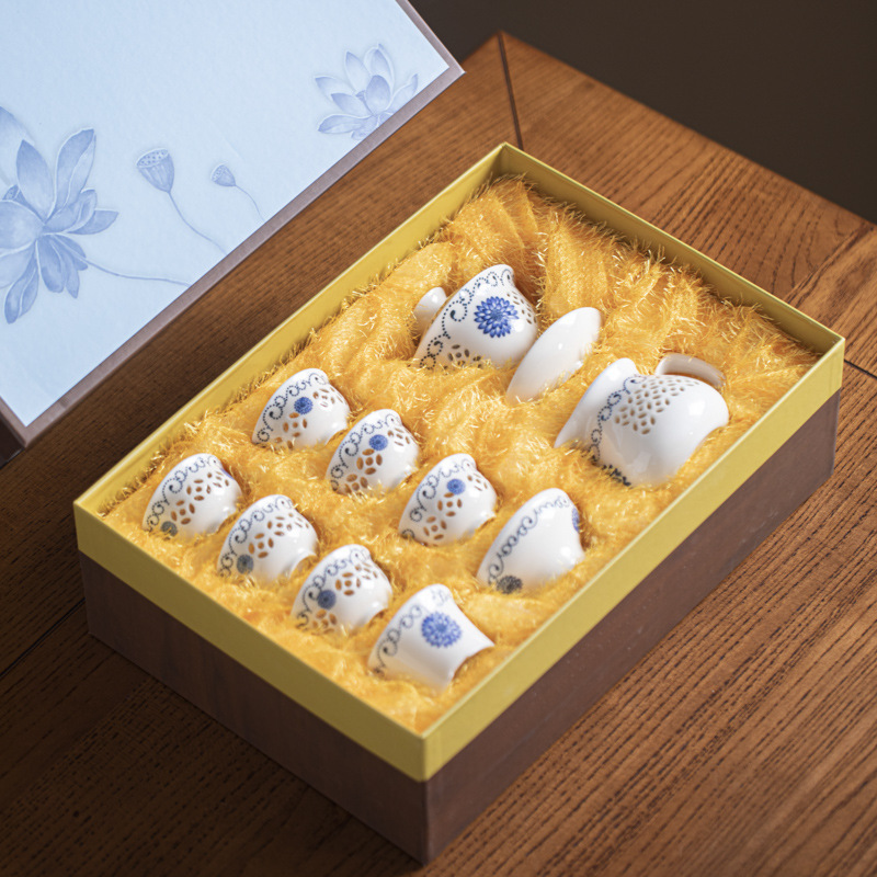 White porcelain exquisite hollow kung fu tea set gift box suit set home light luxury high-end tea maker creative gift White porcelain exquisite hollow kung fu tea set gift box suit set home light luxury high-end tea maker creative gift
