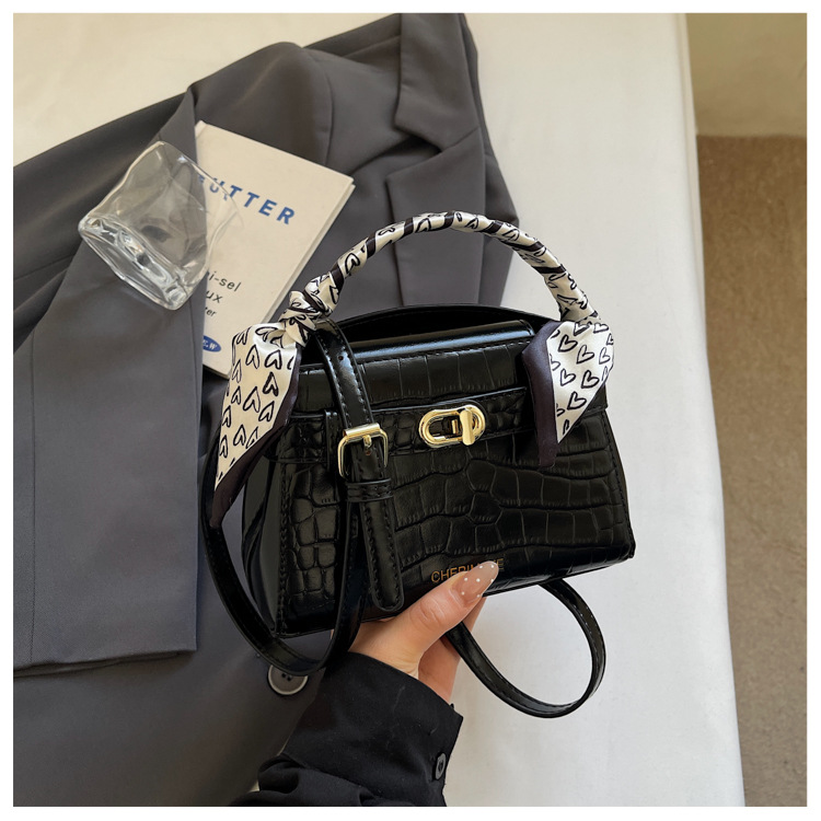 Bolso de mano de diseño de nicho para mujeres 2026 nuevo patrón de textura de cocodrilo bolso cuadrado alto lujo ligero de hombro mochila