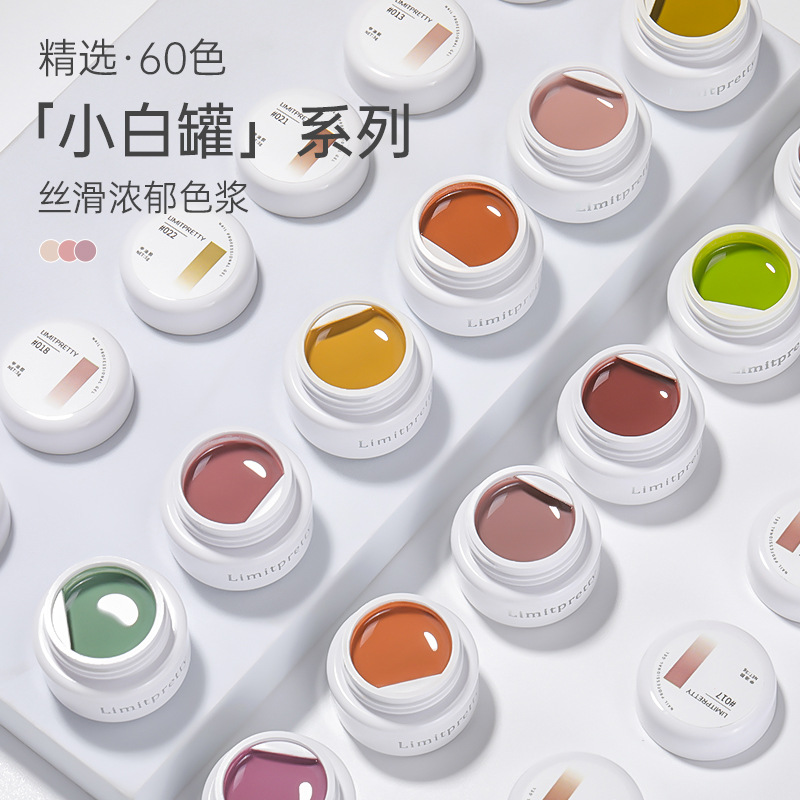 Transfronterizo marea manicure nuevo estilo japonés enlatado blanco 60 color esmalte de uñas pegamento especial de manicure al por mayor