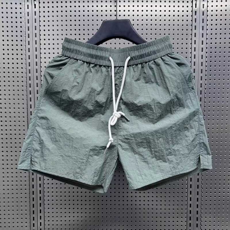 Summer New Light Breathable Ice Silk Quick-drying Shorts Men's Trendy All-match Casual Three-part Pants Solid Color Beach Pants