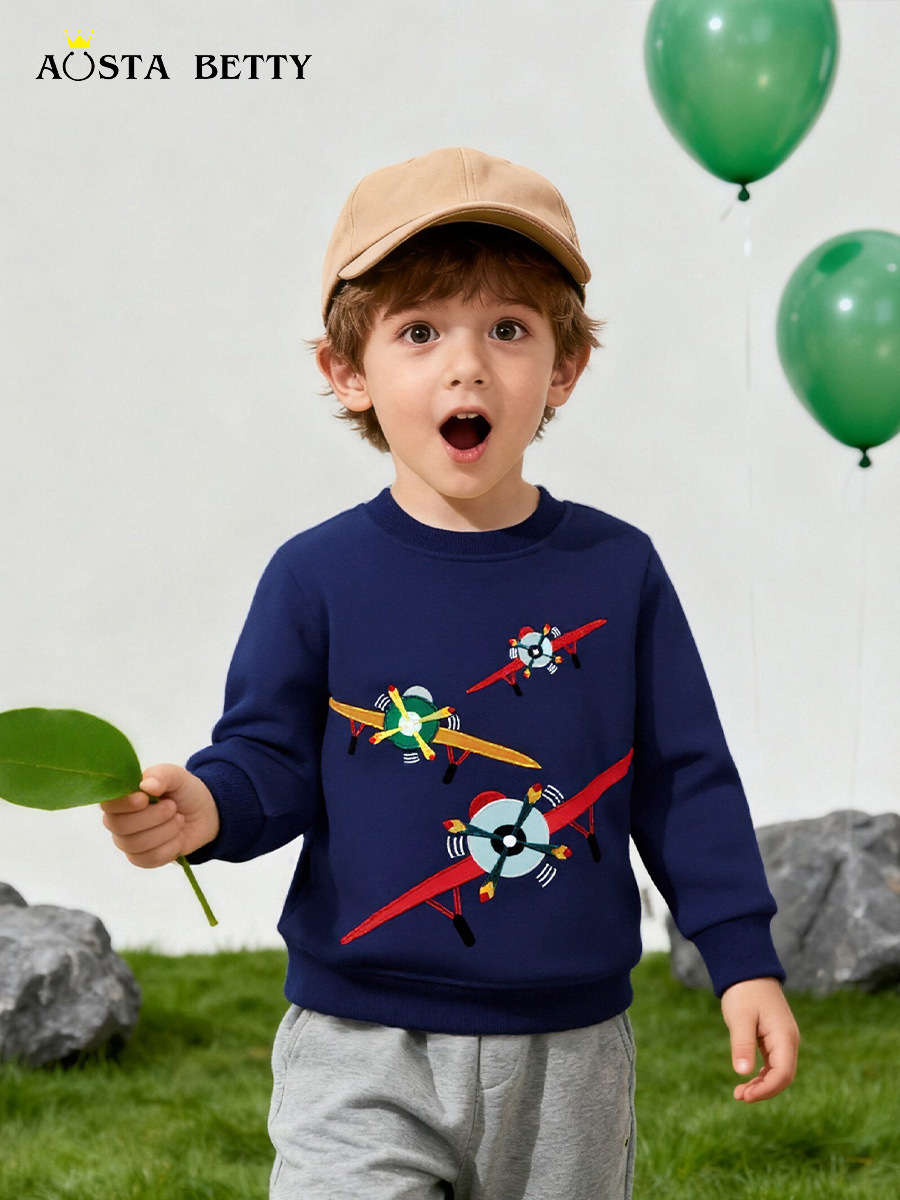 Nuevos productos de otoño Suéter para niños Suéter para niños de cuello redondo de estilo europeo y americano Sudadera de manga larga para niños bordada de avión de dibujos animados