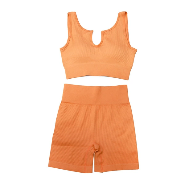 Bra, orange shorts