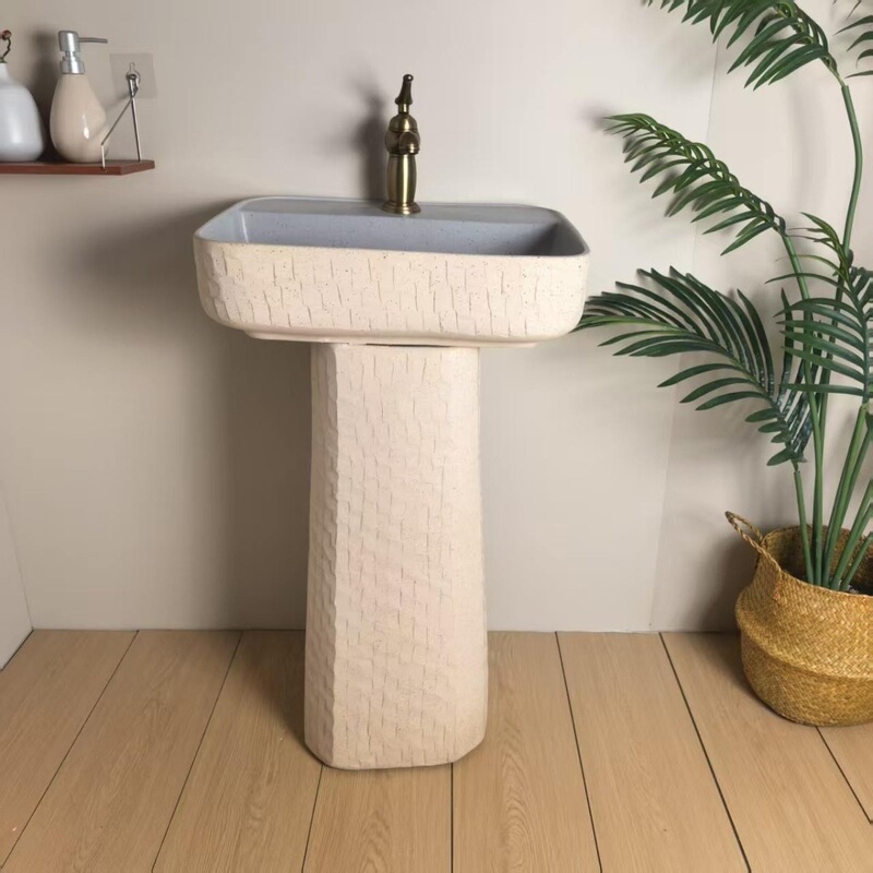 Floor-standing bathroom cabinet with integrated washbasin and ceramic basin