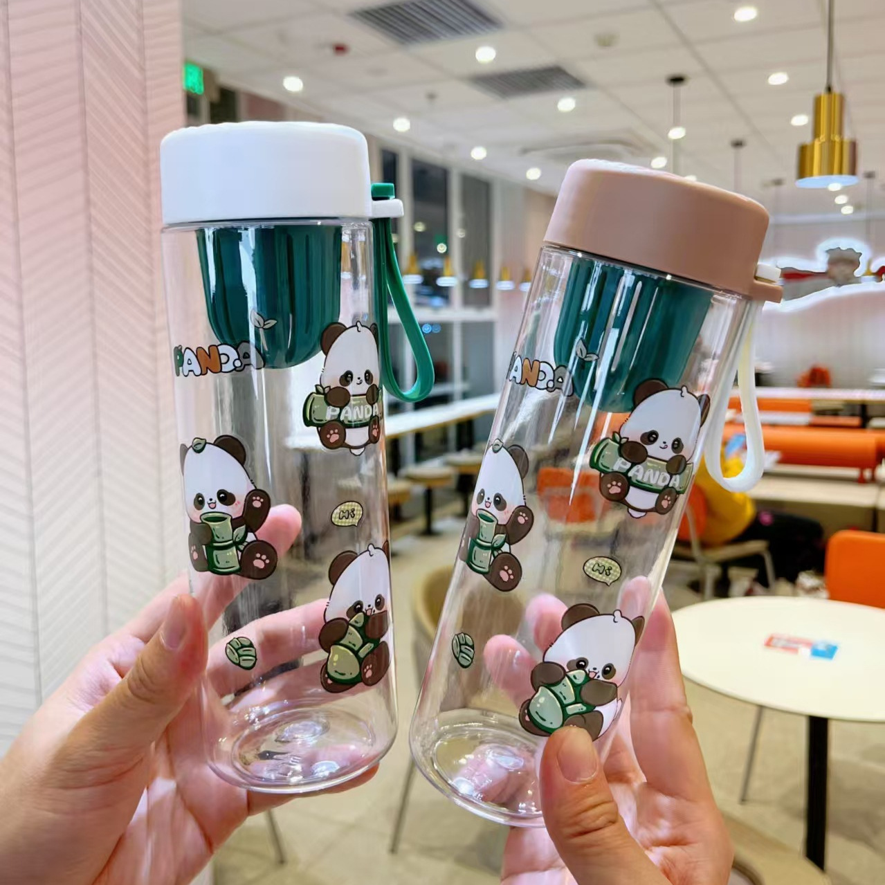 Yitongxin hervidor deportivo de plástico de dibujos animados panda taza de agua de gran capacidad acondicionamiento físico al aire libre portable taza de bebida directa fabricantes