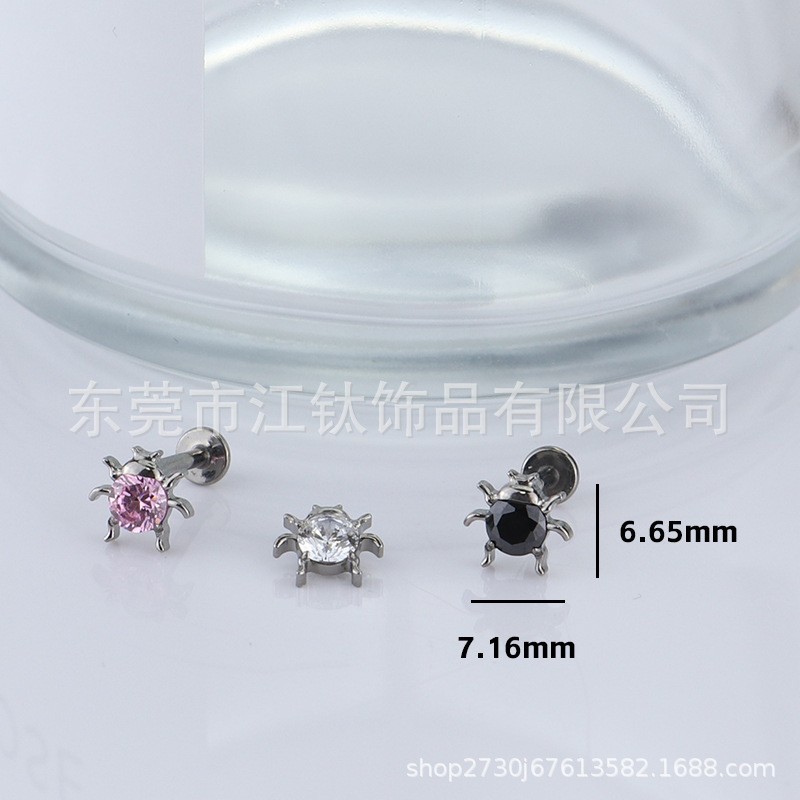 Silver pointed spike labret stud material detail