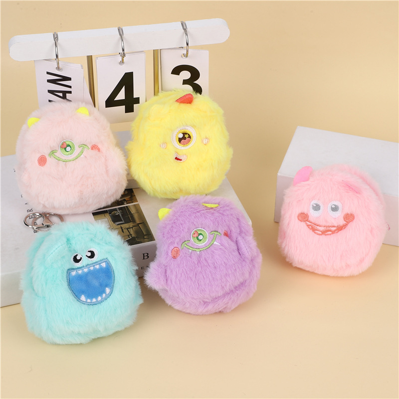 Corazón de una niña lindo pequeño monstruo bolso de cambio de peluche bolso de monedas de auriculares portátiles bolso de almacenamiento multifuncional bolso de llaves