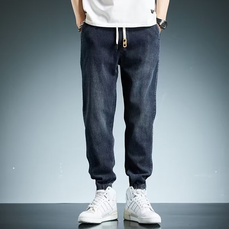 2024 primavera y otoño pantalones vaqueros de cintura elástica todo fósforo para hombres, pantalones de pierna ancha rectos sueltos para adolescentes de la calle principal