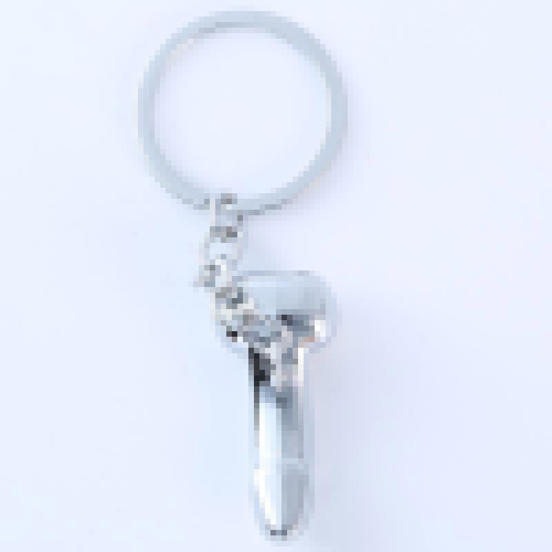 Aleación de zinc regalo creativo sexy divertido modelo llavero plata bronce poli caro en stock al por mayor