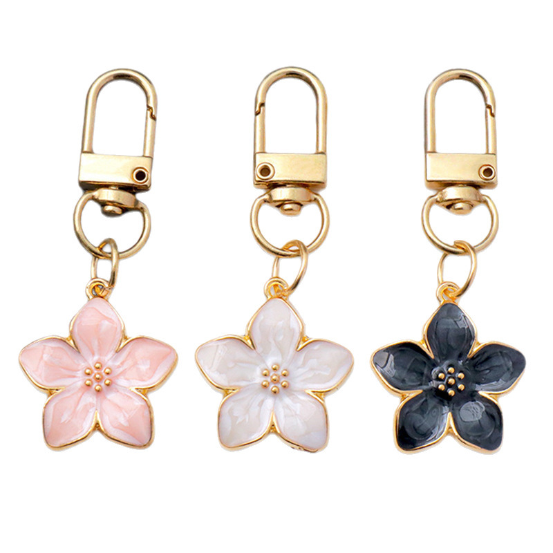 国境を越えた工場直販の売れ筋かわいいカラフルなオイルドリップ真珠光沢のある5枚の花びらの桜キーホルダーペンダントバッグペンダント|undefined