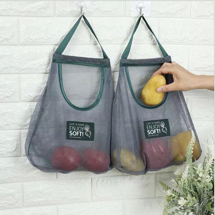 Kitchen multi-functional fruit and vegetable hanging bag ginger and garlic storage god wall-mounted garlic and ginger storage bag breathable mesh bag