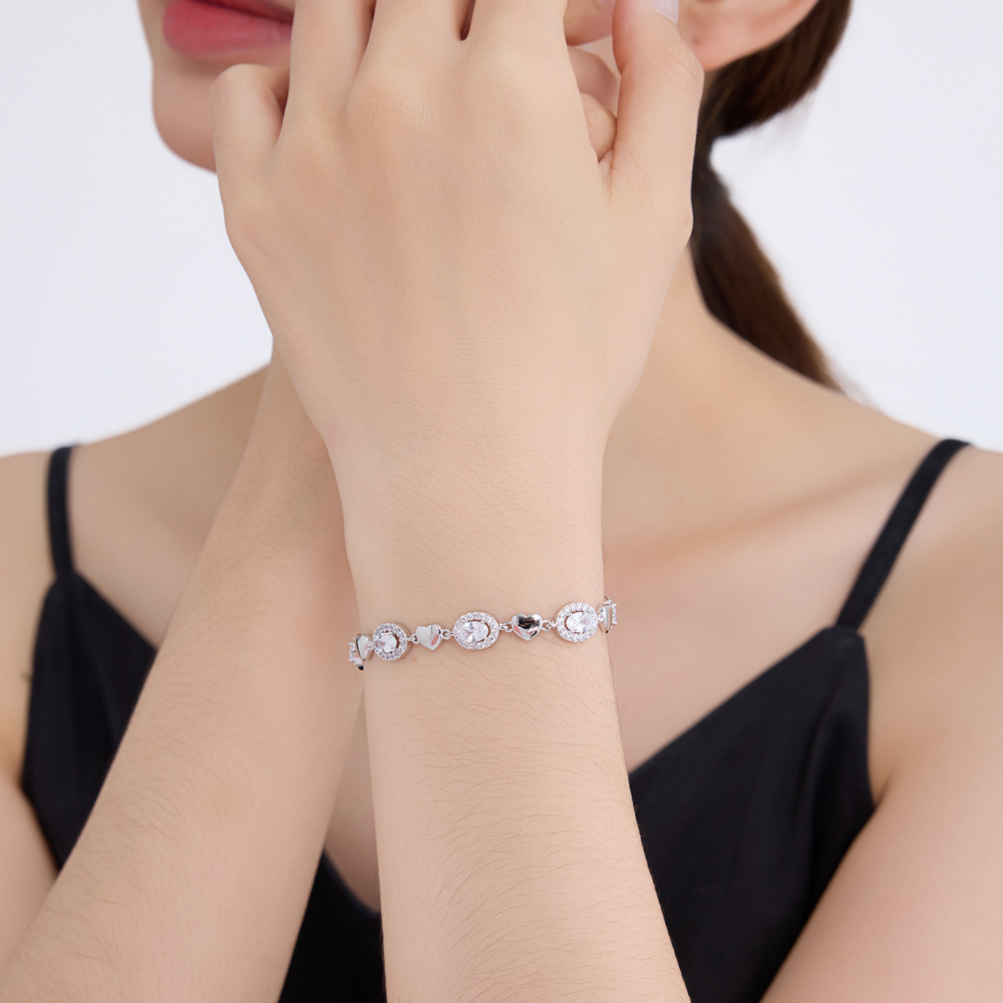 Xuping lujoso temperamento elíptico geometría brillante amor empalme pulsera aleación de cobre dulce suave joyería de mano al por mayor