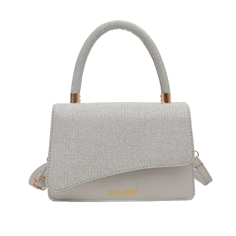 Verano nuevo estilo 2025 bolso de axila popular moda textura simple bolso de viaje pequeño para mujer pu hombro pequeño bolso cuadrado mano