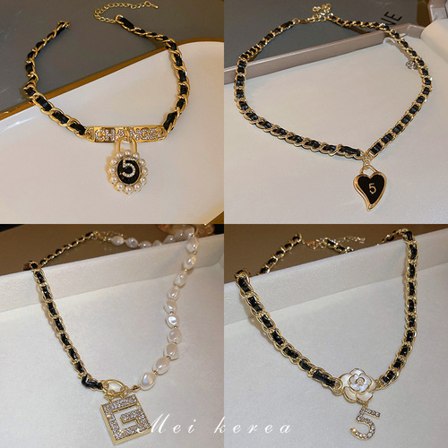 Autumn and winter retro diamond-encrusted letter pearl flower leather winding necklace high-end temperament sweater chain internet celebrity necklace
