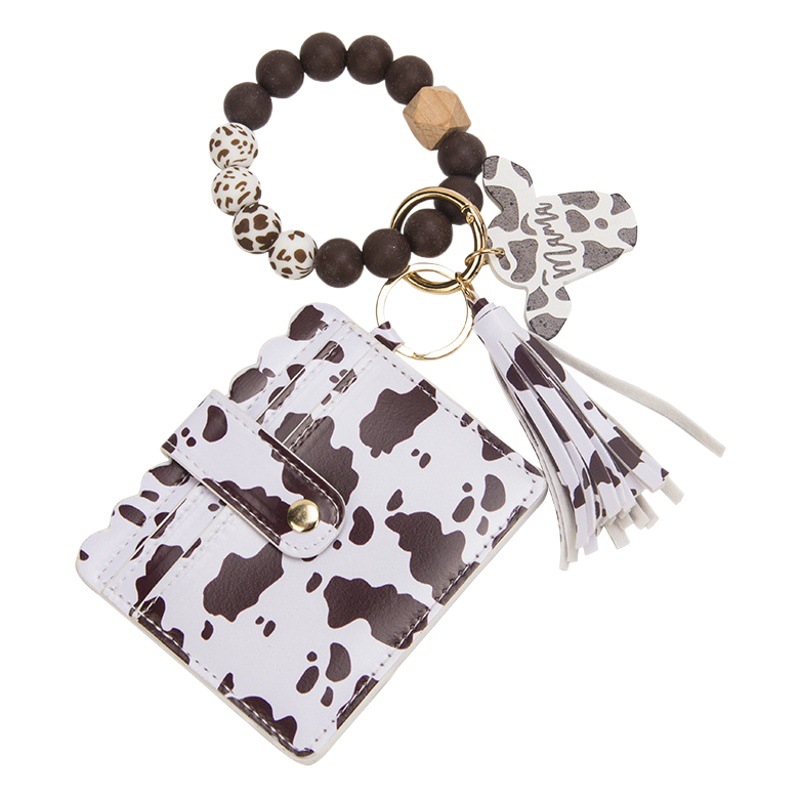 2023 transfronteriza nueva MAMA Cabeza de Vaca pulsera de cuentas de silicona titular de la tarjeta pulsera de cuero Cabeza de Vaca chip de madera llavero colgante