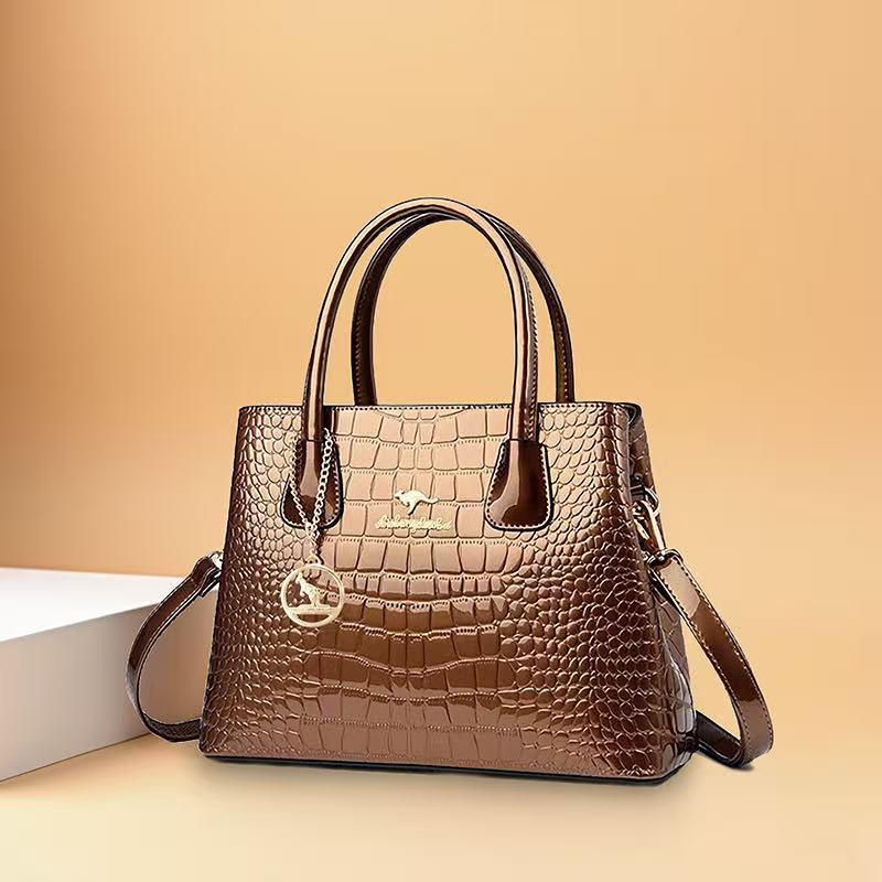 Bolso de mujer en caliente, nuevo tipo de bolso canguro, bolso de cinturón, bolso de mano de piel esmaltada brillante, bolso de hombro de mujer, agencia de cabello