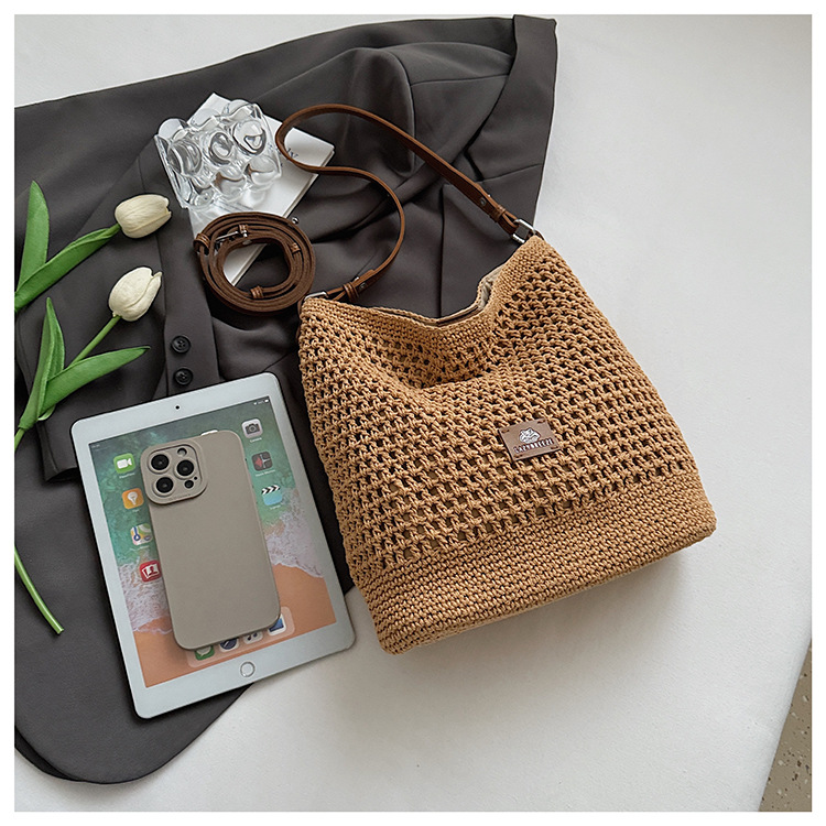 Summer hollowed-out knitted underarm bag for women, 2025 new style, laid-back and relaxed, seaside vacation style single-shoulder crossbody bag undefined