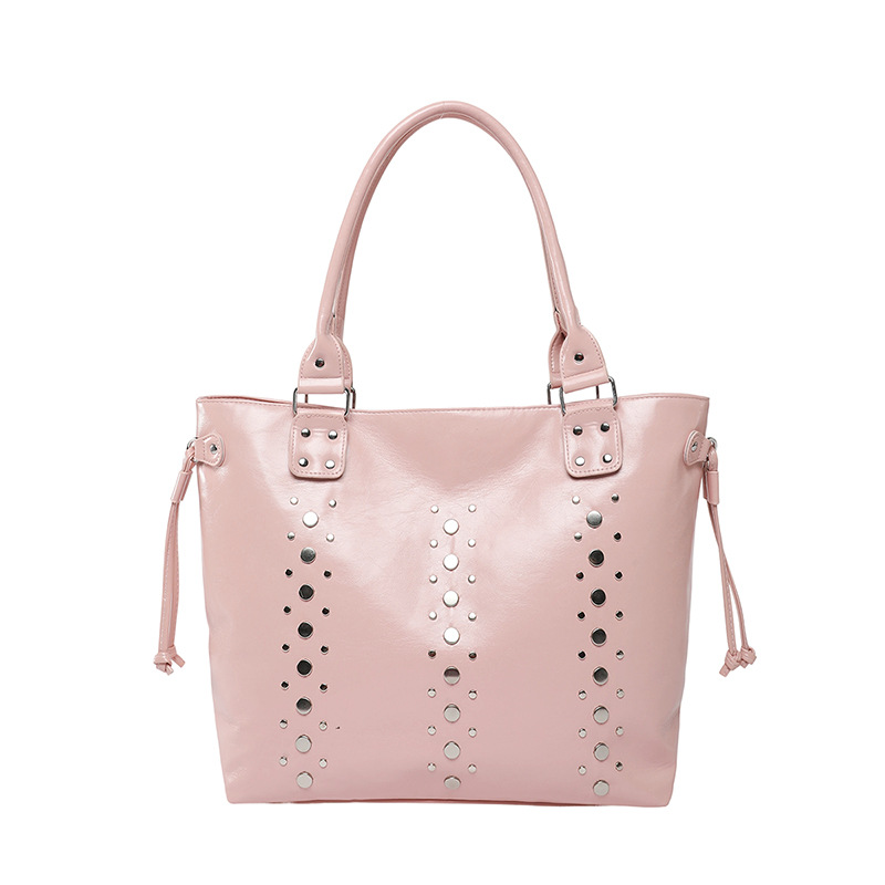 Bolso Tote de textura transfronteriza 2025 verano nuevo bolso femenino personalizado bolso de remache bolso de hombro de gran capacidad de moda