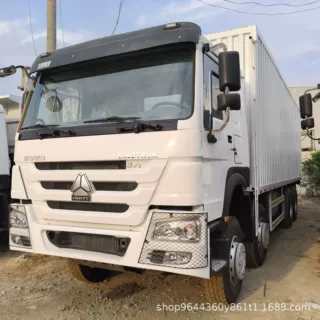 跨境出售9成新豪沃8*4厢式货车/后八轮拉砂石料渣土车拖车