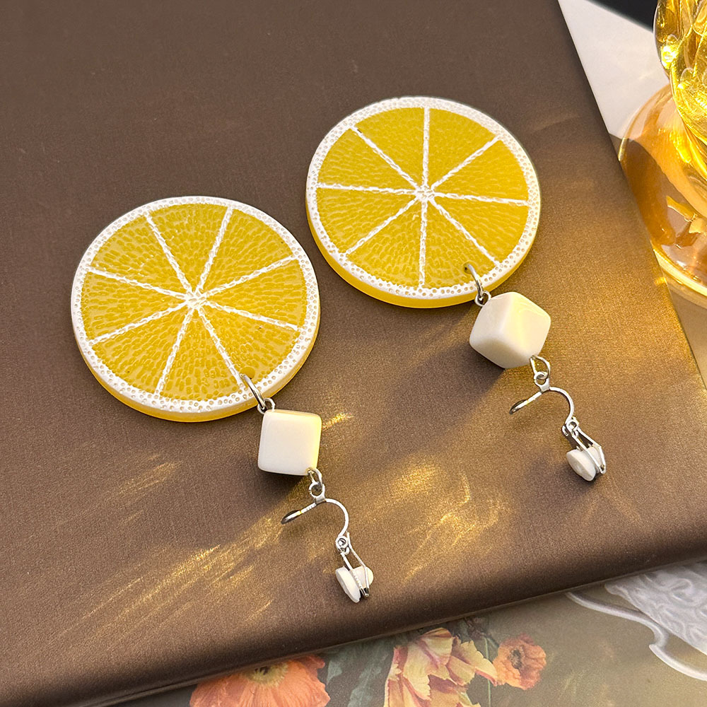 Pendientes de limón pequeño fresco coreano sin orejas, pendientes simples y de moda de todo fósforo, lujo ligero, pendientes de nicho de alta gama, mujeres