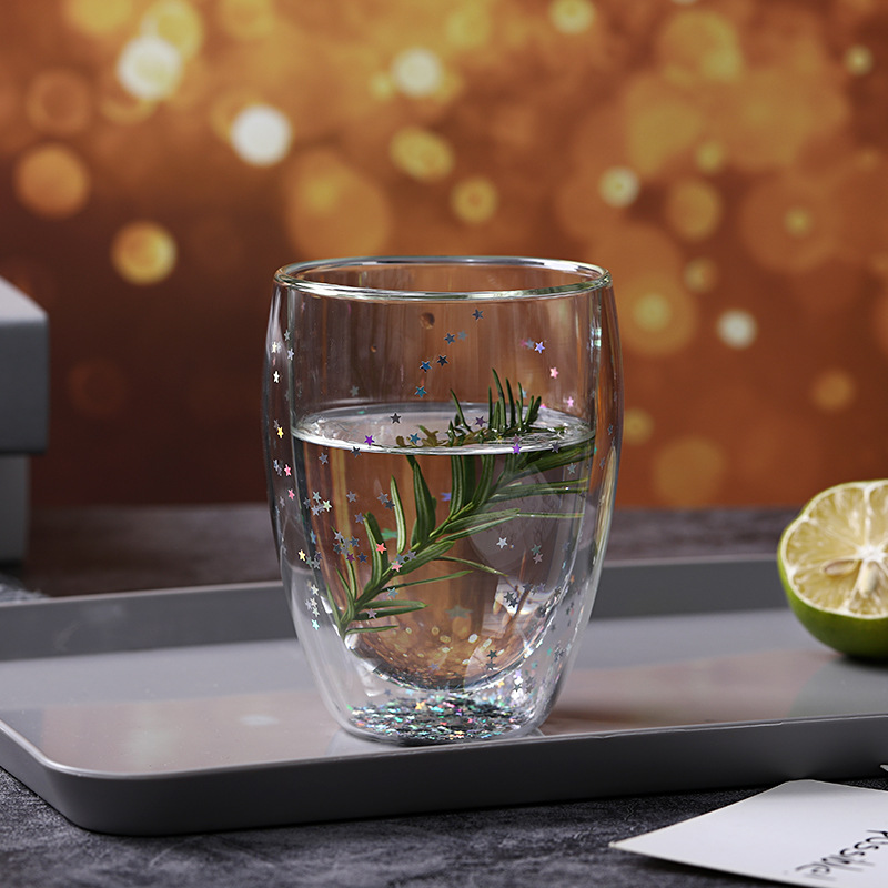 Sequinilla personalizada doble aislamiento de vidrio estrella taza logotipo personalizado taza de regalo taza de huevo transparente fabricante e