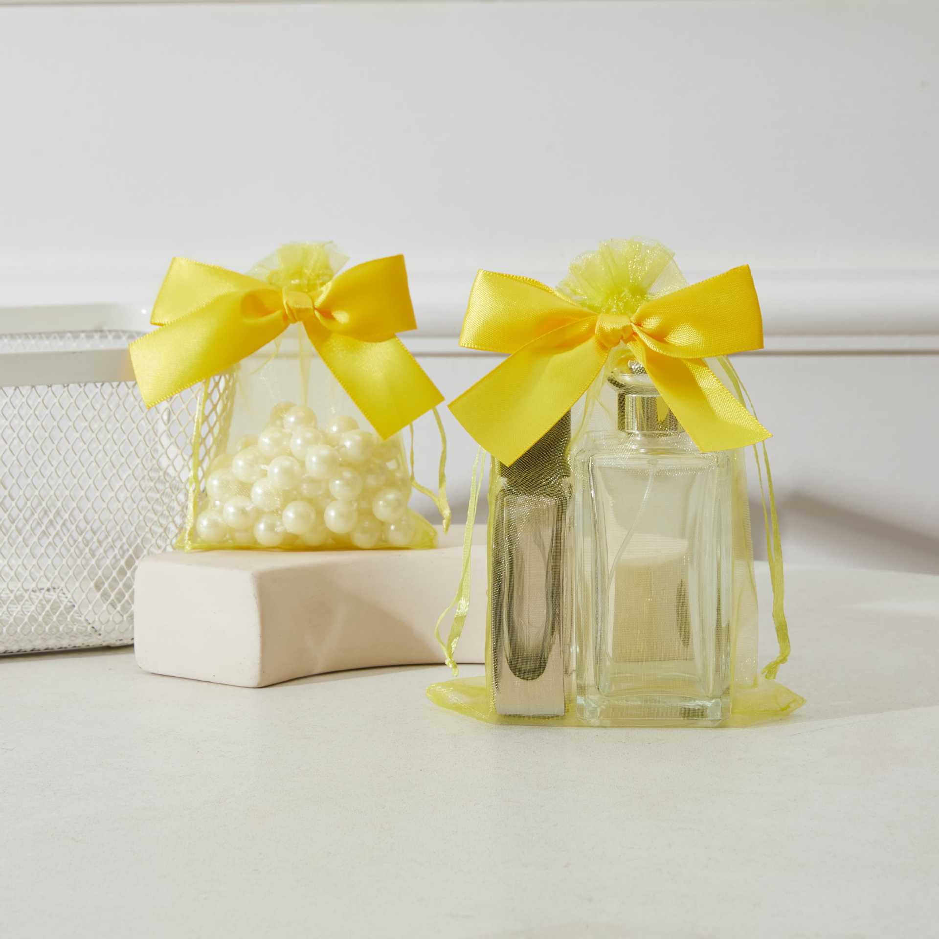 Bolso de gasa con lazo dorado transfronterizo, bolsa de dulces de boda, bolsa de regalo para fiesta, bolsa de embalaje de regalo, bolsillo con cordón