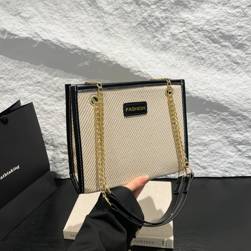 2025 primavera nueva moda temperamento bolso de alta capacidad bolso de brazo simple bolso de nicho bolso de hombro