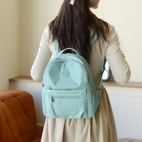 Minimalist solid color women's double shoulder bag, Korean style, versatile small backpack, fashionable canvas, hot selling, breathable and lightweight